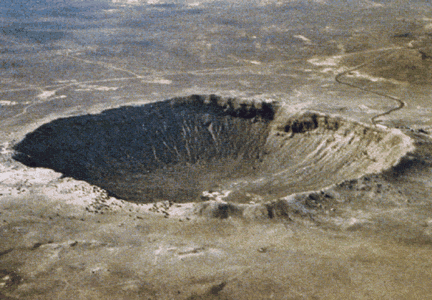 This is the Barringer Meteor Crater in Arizona. The diameter is 1.2
  kilomters, and it is 49,000 years old. Compared with other planets, <a
  href="/earth/Interior_Structure/crater.html">impact
  craters</a> are rare <a
  href="/earth/Interior_Structure/surface_features.html">surface
  features</a> on Earth. There are two main reasons for the low number of
  craters. One is that our <a
  href="/earth/Atmosphere/overview.html">atmosphere</a>
  burns up most <a
  href="/our_solar_system/meteors/meteors.html">meteoroids</a>
  before they reach the surface. The other reason is that Earth's surface is <a
  href="/earth/interior/plate_tectonics.html">continually
  active</a> and erases the marks of craters over time.<p><small><em>D. Roddy and LPI</em></small></p>
