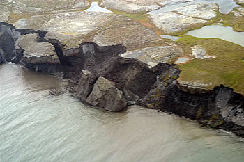As permafrost thaws, the land, atmosphere, water resources, ecosystems, and human communities are affected. Coastal areas and hillsides are vulnerable to erosion by thawing of permafrost.  Thawing permafrost also causes a positive feedback to global warming, as carbon trapped within the once-frozen soils is released as <a href="/physical_science/chemistry/methane.html&edu=high&dev=1/windows.html">methane</a>, a powerful <a href="/earth/climate/cli_greengas.html&edu=high&dev=1/windows.html">greenhouse gas</a>.
Watch the NBC Learn video - <a href="/earth/changing_planet/permafrost_methane_intro.html&edu=high&dev=1/windows.html">Thawing Permafrost and Methane</a> to find out more.<p><small><em>Image courtesy of the    USGS</em></small></p>