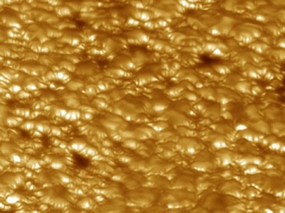 The "surface" of the Sun (the <a href="/sun/atmosphere/photosphere.html&edu=elem&dev=">photosphere</a>) is covered with a "granulation pattern" caused by the convective flow of heat rising to the photosphere from the <a href="http://www.windows2universe.org/sun/solar_interior_new.html">Sun's interior</a>. The granulation pattern is similar to what you see when you look at the top of a pot of boiling oatmeal. Note how the hotter centers of granules bulge upward, while the cooler edges are sinking downward.<p><small><em> Image courtesy of Goran Scharmer and Mats G. Lfdahl of the Royal Swedish Academy of Sciences</em></small></p>